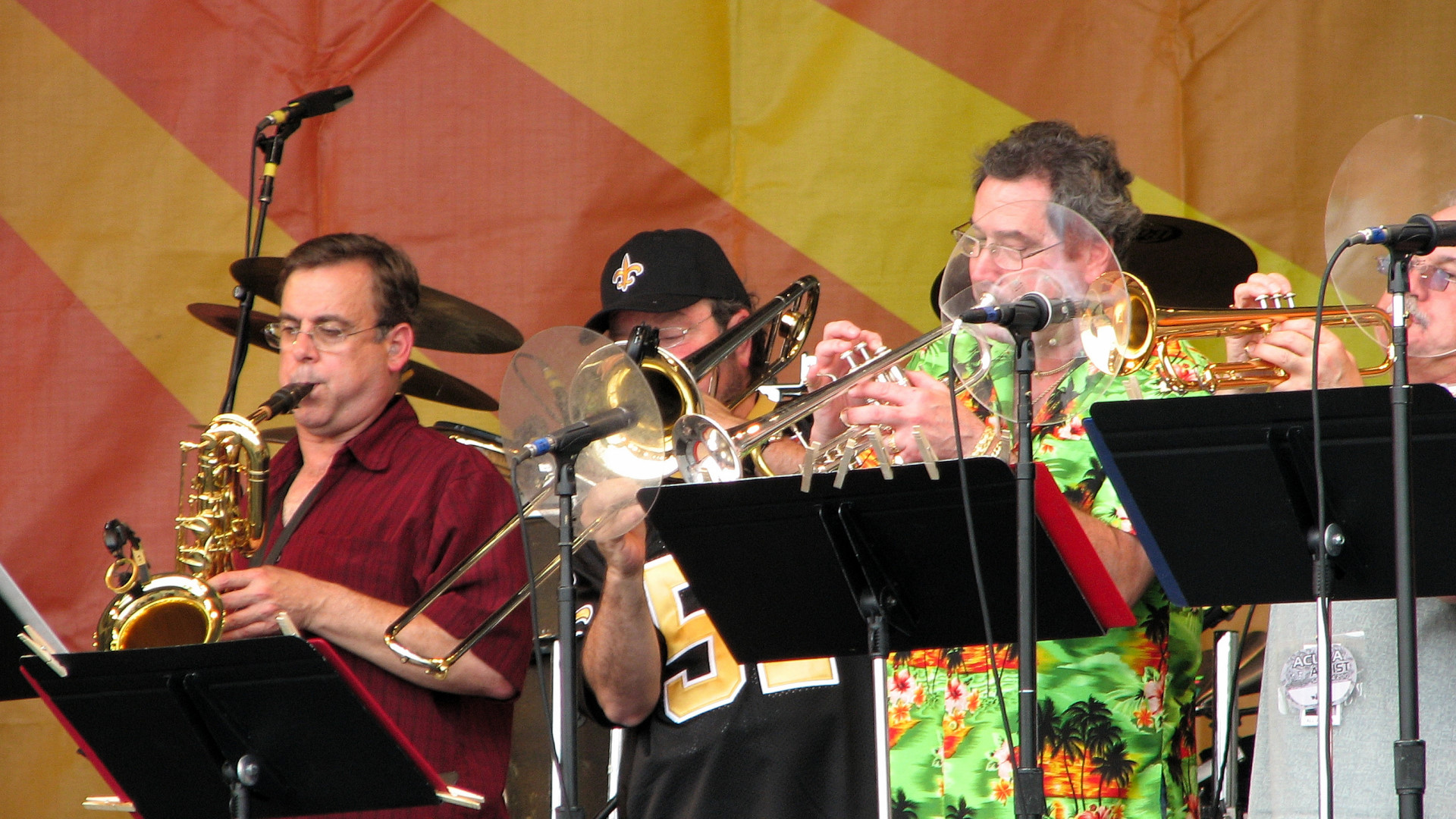 Ward Smith on sax, Mike Genevay on trombone, and trumpeters Jimmy Weber and A. J. Pittman