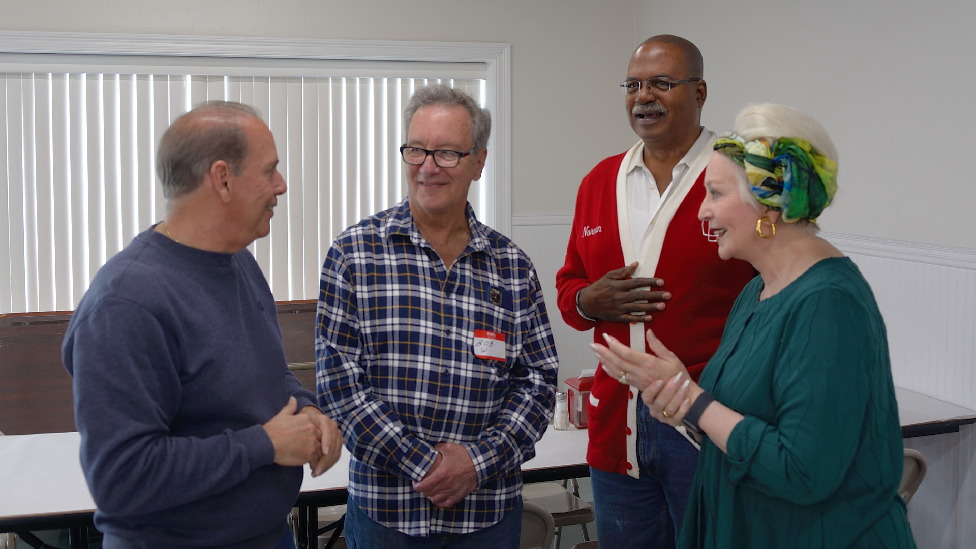 Host Bob Walker with Norman Robinson and Angela Hill 